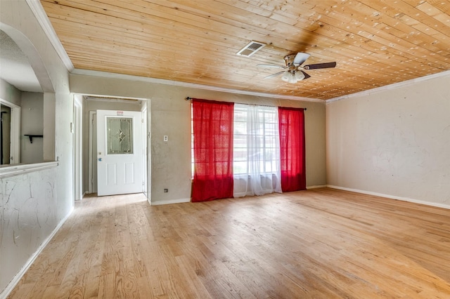 811 Tarryall Dr, Dallas, TX 75224 - spare room featuring ornamental molding, wood finished floors, ceiling fan, wood ceiling, and arched walkways