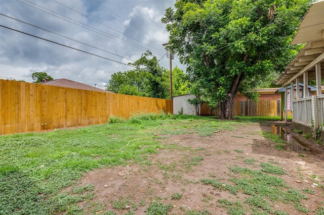 811 Tarryall Dr, Dallas, TX 75224 - fenced backyard with a storage shed