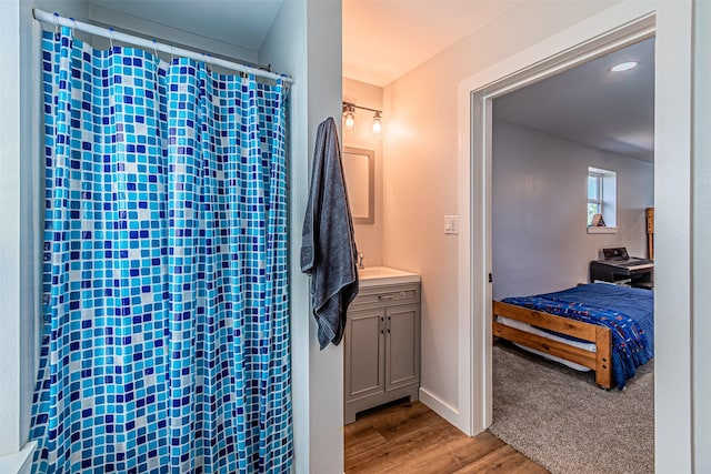 3135 Brazos River Dr, Granbury, TX 76048 - bathroom with vanity and wood finished floors