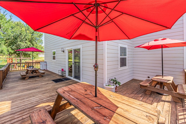 3135 Brazos River Dr, Granbury, TX 76048 - wooden deck featuring outdoor dining area