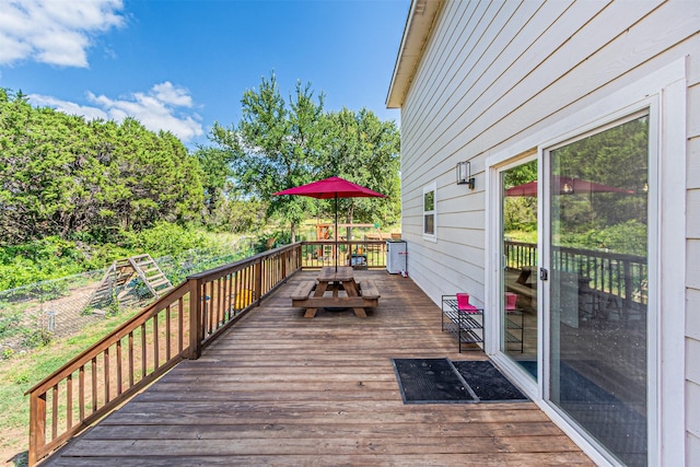 3135 Brazos River Dr, Granbury, TX 76048 - wooden deck with outdoor dining space