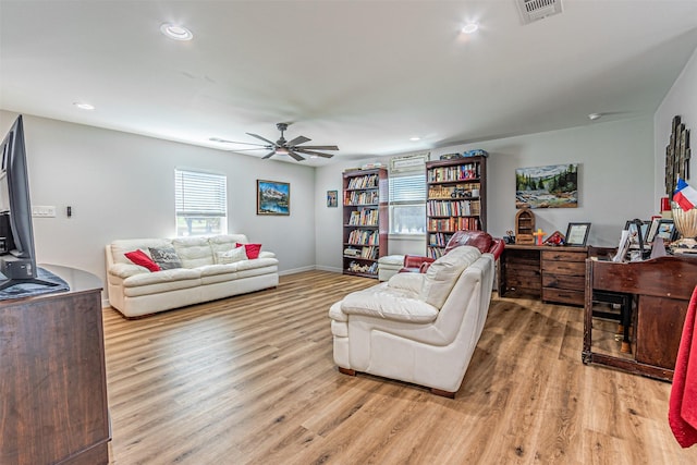 3135 Brazos River Dr, Granbury, TX 76048 - living area with light wood-style floors, a ceiling fan, and recessed lighting