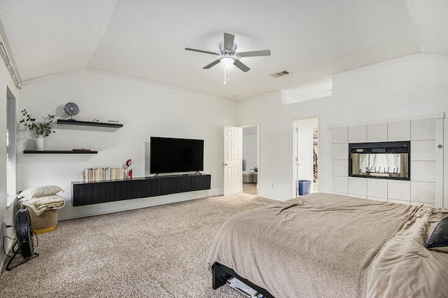 6833 Permian Ln, Fort Worth, TX 76137 - carpeted bedroom with lofted ceiling, a tiled fireplace, and ceiling fan