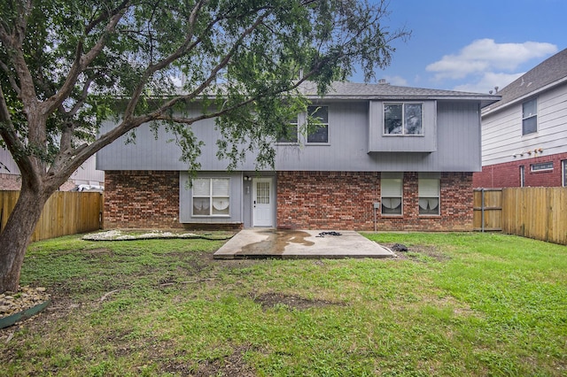 6833 Permian Ln, Fort Worth, TX 76137 - rear view of property with a patio area, brick siding, and a fenced backyard