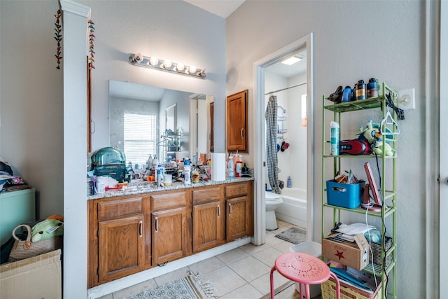 1612 Hackamore St, Mesquite, TX 75149 - bathroom featuring tile patterned flooring, vanity, and shower / bath combo