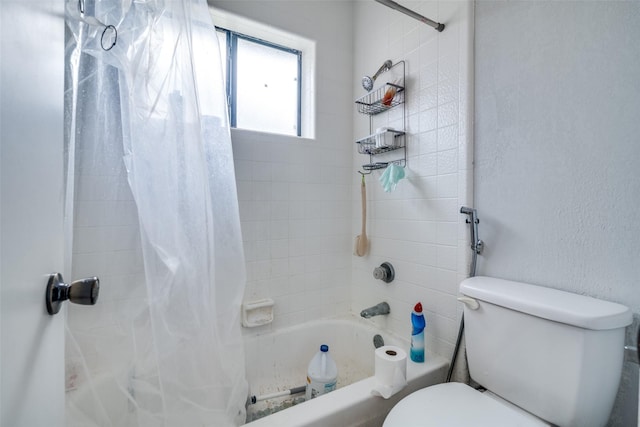 1612 Hackamore St, Mesquite, TX 75149 - bathroom featuring shower / tub combo with curtain and toilet