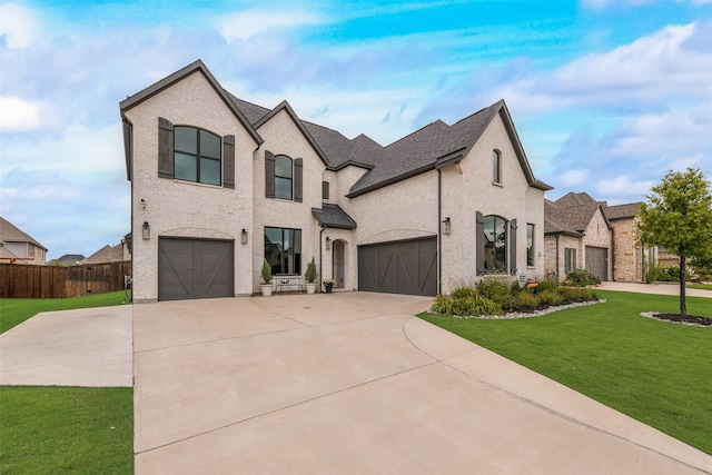 3900 Brazoria Dr, Prosper, TX 75078 - french country inspired facade featuring concrete driveway