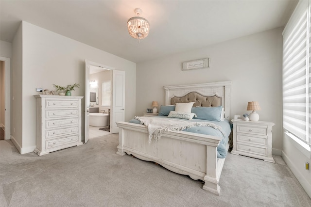 3900 Brazoria Dr, Prosper, TX 75078 - bedroom with carpet flooring, a chandelier, and ensuite bath