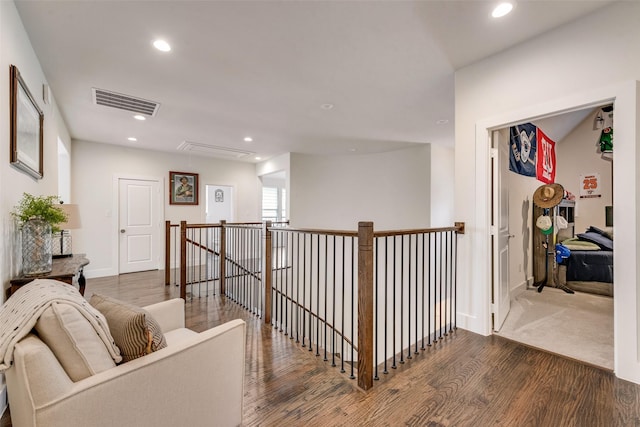 3900 Brazoria Dr, Prosper, TX 75078 - corridor featuring attic access, wood finished floors, an upstairs landing, and recessed lighting