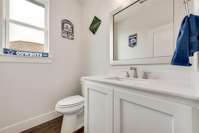 3900 Brazoria Dr, Prosper, TX 75078 - half bathroom featuring vanity and wood finished floors