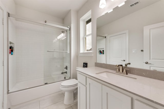 3900 Brazoria Dr, Prosper, TX 75078 - full bath featuring vanity, combined bath / shower with glass door, and tile patterned flooring