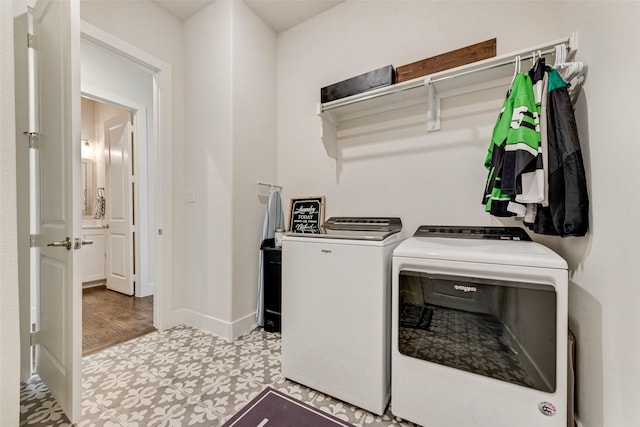 3900 Brazoria Dr, Prosper, TX 75078 - laundry room with separate washer and dryer and baseboards