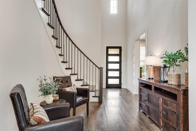 3900 Brazoria Dr, Prosper, TX 75078 - foyer with a towering ceiling, dark wood finished floors, and stairs