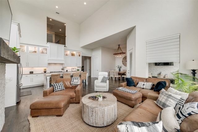 3900 Brazoria Dr, Prosper, TX 75078 - living room with a high ceiling, dark wood finished floors, and recessed lighting