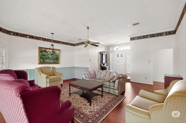 2705 Willowood Dr, Grapevine, TX 76051 - living area with dark wood-style floors, ornamental molding, and ceiling fan