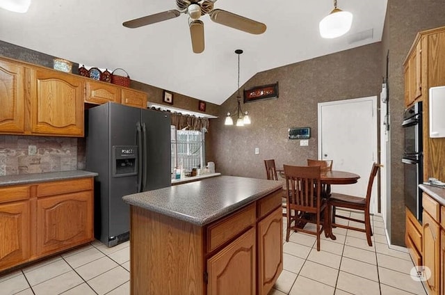 2705 Willowood Dr, Grapevine, TX 76051 - kitchen with black appliances, light tile patterned floors, lofted ceiling, ceiling fan, and brown cabinetry