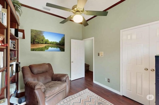2705 Willowood Dr, Grapevine, TX 76051 - living area with a ceiling fan, dark wood-type flooring, and crown molding