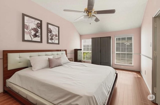 2705 Willowood Dr, Grapevine, TX 76051 - bedroom with vaulted ceiling, wood finished floors, and ceiling fan