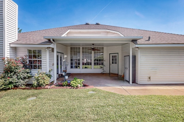 2705 Willowood Dr, Grapevine, TX 76051 - rear view of property with a yard, a shingled roof, and a ceiling fan