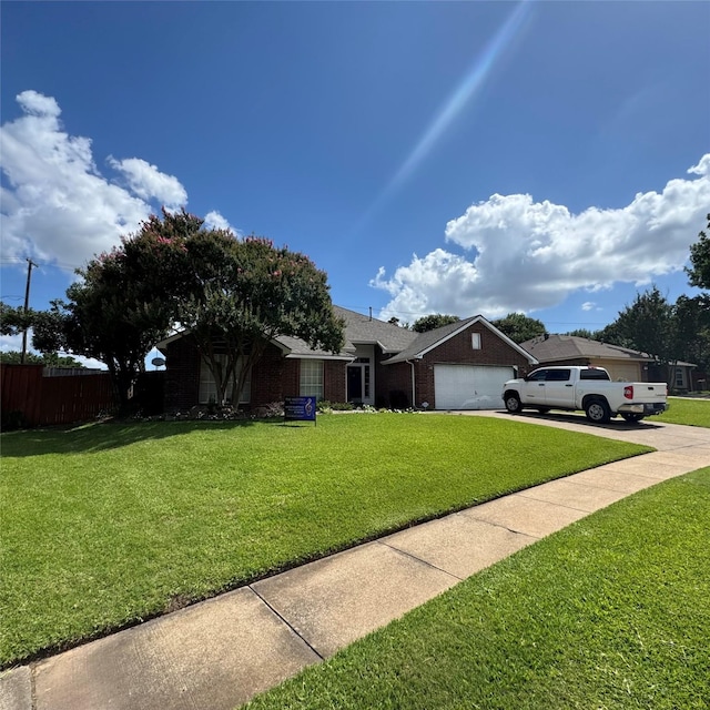 2705 Willowood Dr, Grapevine, TX 76051 - view of front facade with brick siding, a garage, and concrete driveway