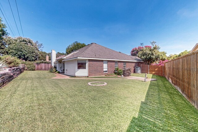 2705 Willowood Dr, Grapevine, TX 76051 - rear view of property featuring brick siding, a fenced backyard, a patio, and a chimney