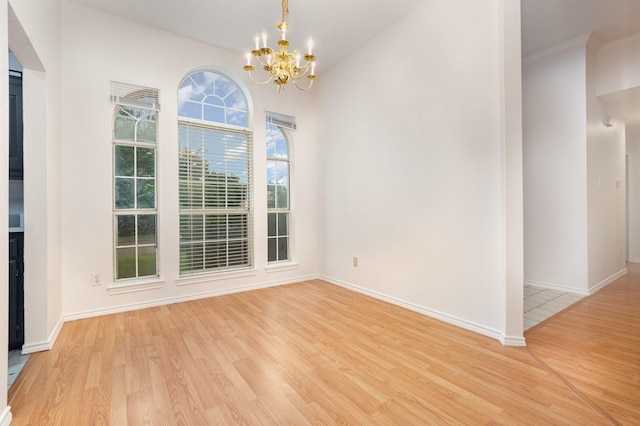 2515 High Pointe Blvd, Mckinney, TX 75071 - unfurnished dining area with a chandelier and light wood-style floors