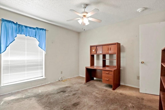 11460 Audelia Rd Unit 172, Dallas, TX 75243 - unfurnished office featuring a ceiling fan, light colored carpet, and a textured ceiling