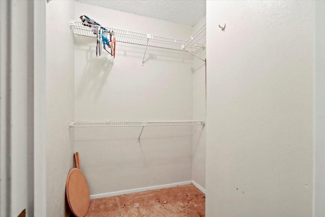11460 Audelia Rd Unit 172, Dallas, TX 75243 - walk in closet with carpet floors