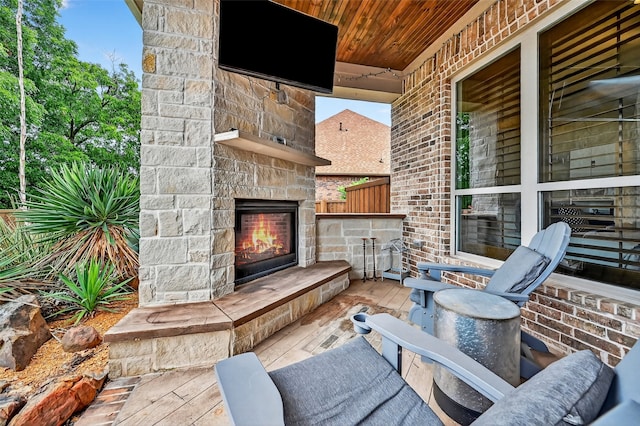 2427 Remuda Dr, Sherman, TX 75092 - view of patio with an outdoor stone fireplace