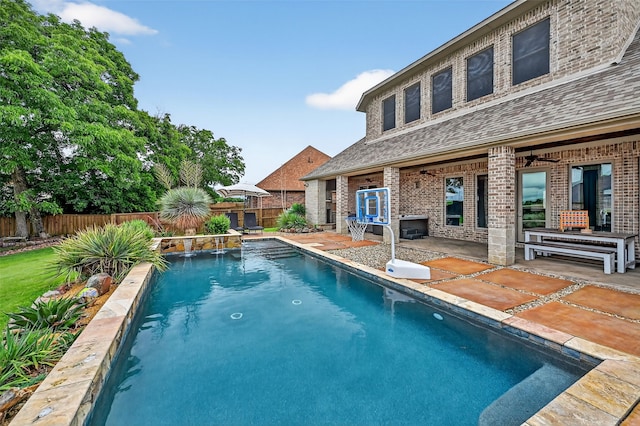 2427 Remuda Dr, Sherman, TX 75092 - view of swimming pool featuring a fenced backyard and a patio