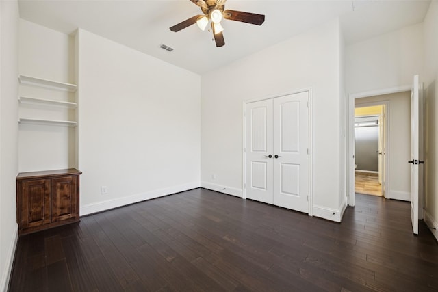 6873 Martel Pl, Frisco, TX 75035 - unfurnished bedroom featuring dark wood-type flooring, ceiling fan, and a closet