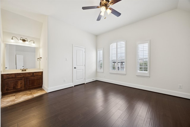 6873 Martel Pl, Frisco, TX 75035 - unfurnished bedroom with wood finished floors, connected bathroom, lofted ceiling, and a ceiling fan