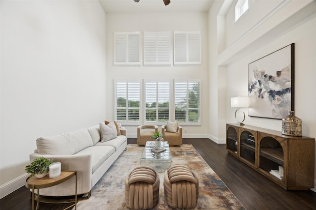6873 Martel Pl, Frisco, TX 75035 - living room with wood finished floors, a ceiling fan, and a towering ceiling