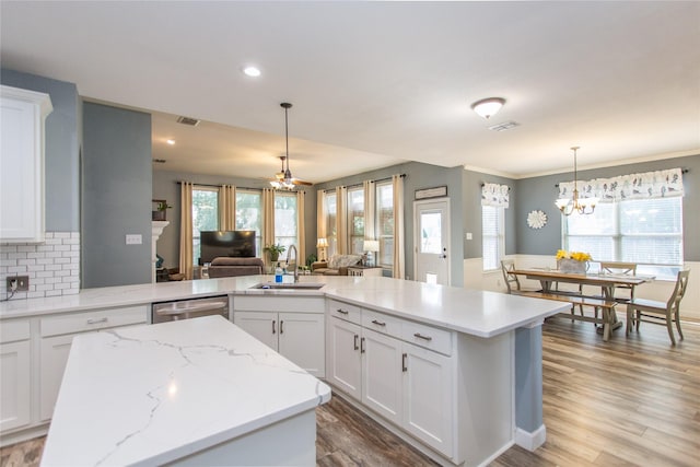 5216 Copper Creek Dr, Fort Worth, TX 76244 - kitchen featuring a chandelier, open floor plan, stainless steel dishwasher, white cabinetry, and recessed lighting
