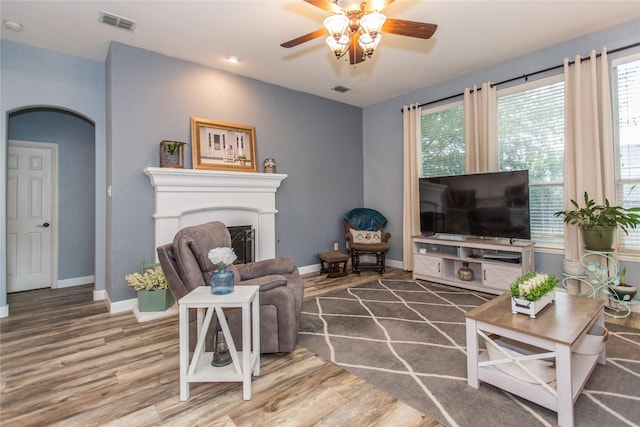 5216 Copper Creek Dr, Fort Worth, TX 76244 - living area with wood finished floors, ceiling fan, and healthy amount of natural light