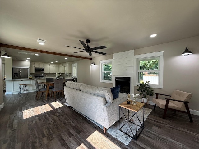 2849 Spruce Park Dr, Richland Hills, TX 76118 - living room featuring dark wood-style floors, recessed lighting, ceiling fan, and a fireplace