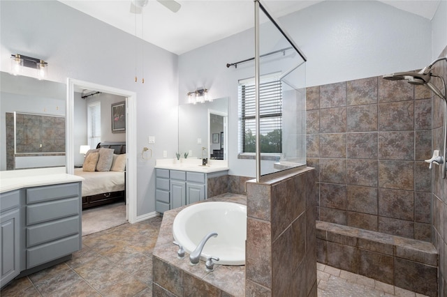 3217 S Bay Breeze Ln, Fort Worth, TX 76179 - bathroom with vanity, a walk in shower, a bath, ceiling fan, and ensuite bath