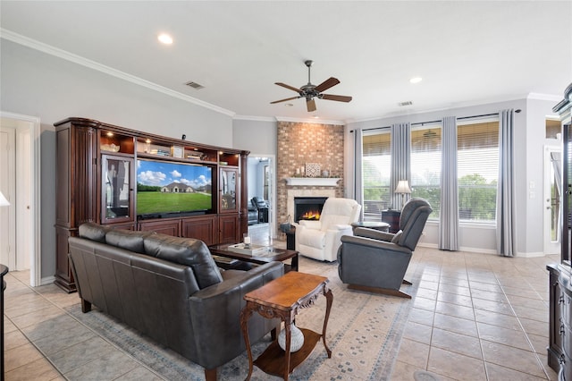 3217 S Bay Breeze Ln, Fort Worth, TX 76179 - living room with ceiling fan, a fireplace, light tile patterned floors, ornamental molding, and recessed lighting