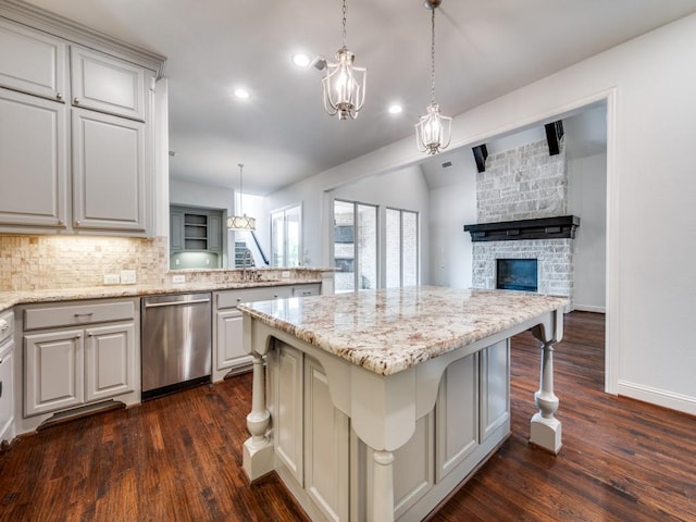 2911 Blackthorn Dr, Prosper, TX 75078 - kitchen with dishwasher, decorative backsplash, dark wood-type flooring, open floor plan, and recessed lighting