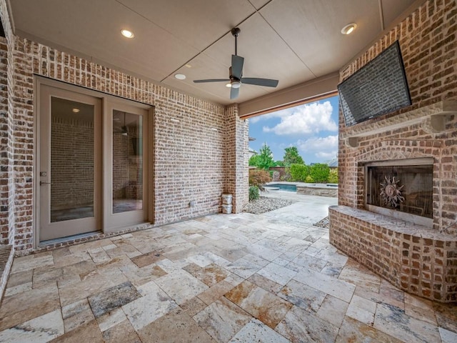 2911 Blackthorn Dr, Prosper, TX 75078 - view of patio / terrace with an outdoor brick fireplace, ceiling fan, and an outdoor pool