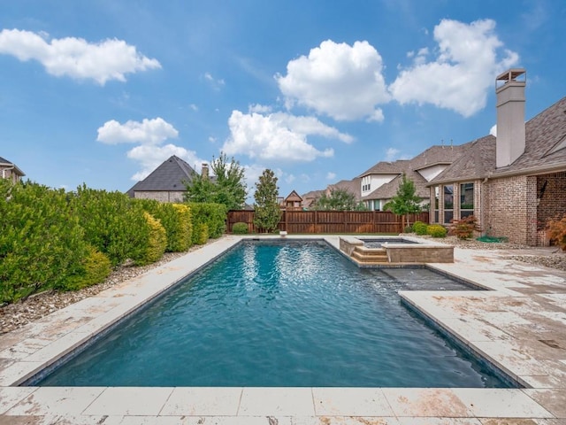 2911 Blackthorn Dr, Prosper, TX 75078 - view of swimming pool featuring a fenced backyard, a patio, and a pool with connected hot tub