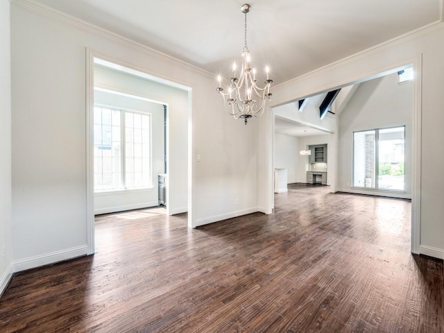 2911 Blackthorn Dr, Prosper, TX 75078 - unfurnished dining area featuring a chandelier, dark wood-style flooring, and crown molding