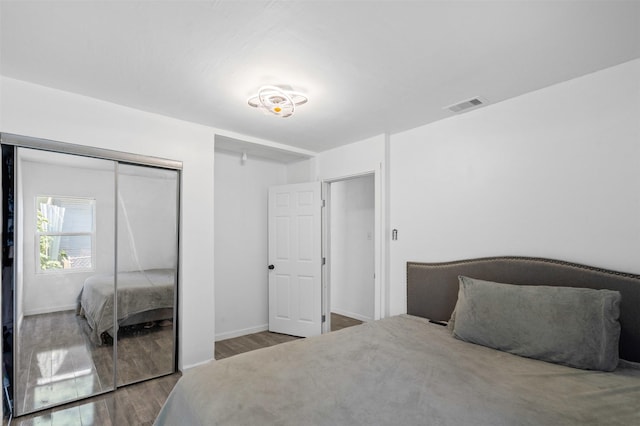 4236 Virginia Ln, Fort Worth, TX 76103 - bedroom featuring wood finished floors and a closet