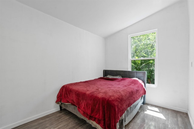 4236 Virginia Ln, Fort Worth, TX 76103 - bedroom featuring lofted ceiling and wood finished floors