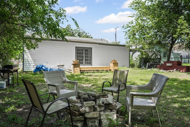 4236 Virginia Ln, Fort Worth, TX 76103 - back of property with french doors and a yard