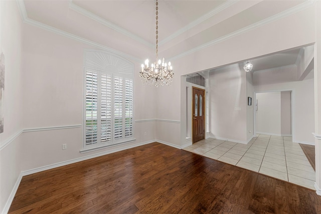 2403 Berry Grove Ct, Melissa, TX 75454 - spare room featuring wood finished floors, a chandelier, ornamental molding, and a tray ceiling