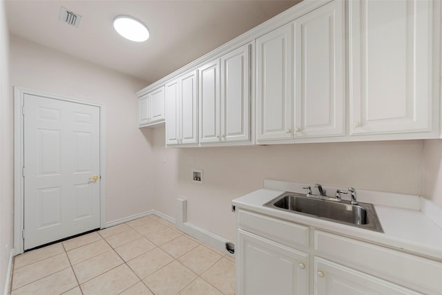 2403 Berry Grove Ct, Melissa, TX 75454 - laundry area with hookup for a washing machine, cabinet space, and light tile patterned flooring