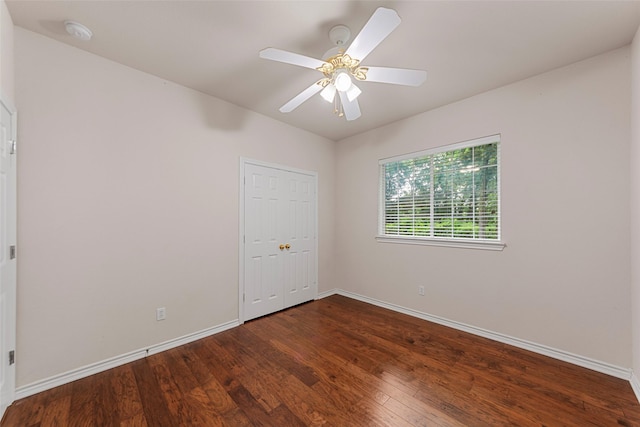 2403 Berry Grove Ct, Melissa, TX 75454 - empty room with a smoke detector, dark wood-type flooring, and ceiling fan