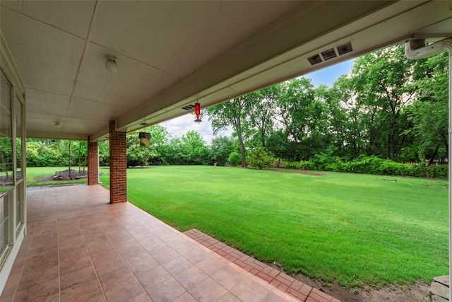 2403 Berry Grove Ct, Melissa, TX 75454 - view of green lawn with a patio and view of wooded area