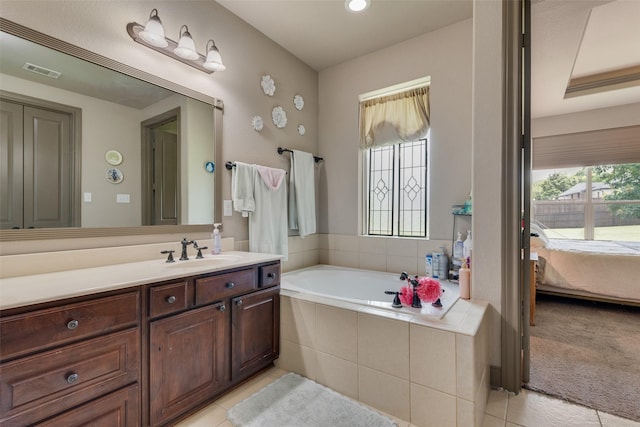 206 Hidden Meadow Cir, Midlothian, TX 76065 - bathroom with plenty of natural light, vanity, a bath, ensuite bath, and recessed lighting